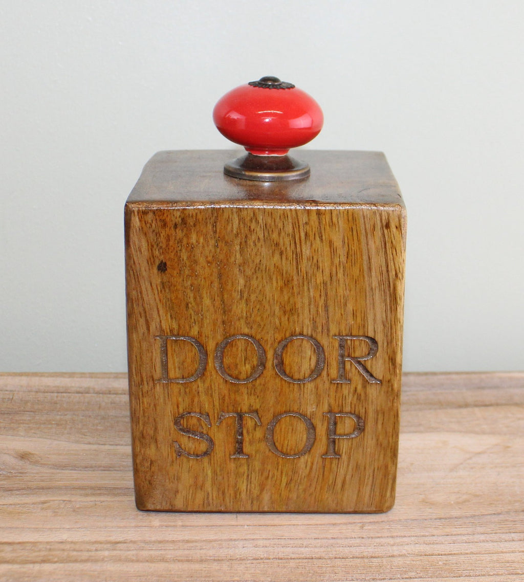Mangoholz Türstopper mit rotem Keramikknopf