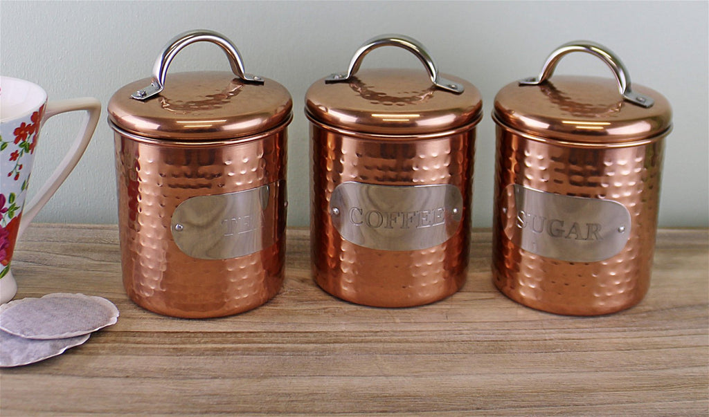 Set bestehend aus Tee-, Kaffee- und Zuckerdose aus gehämmertem Kupfer