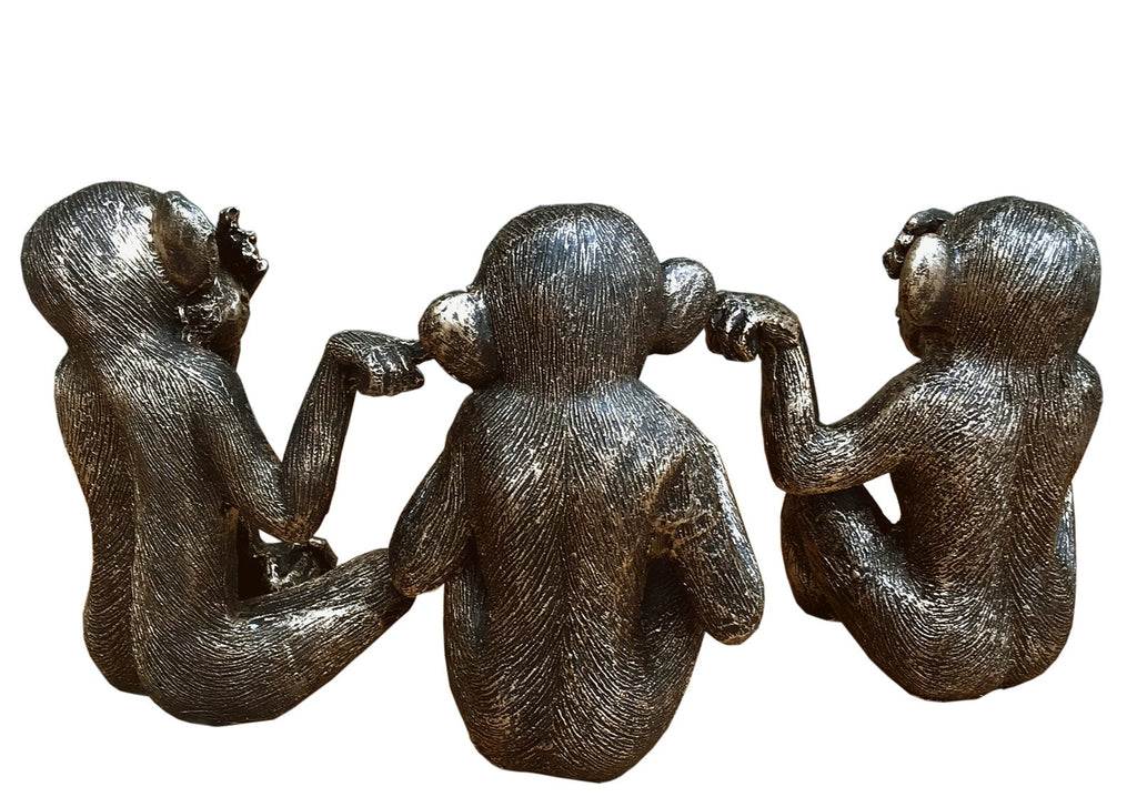 Satz mit drei abgenutzten Affen Figuren