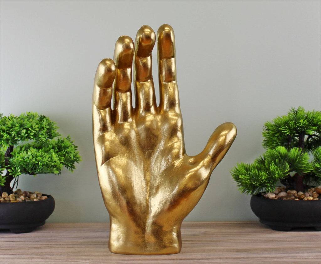 große goldene dekorative Hand